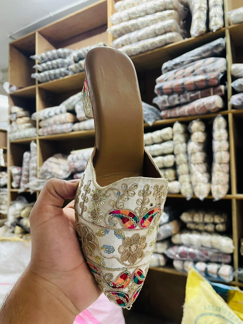 Heel Jutti in Silver Color With Peacock Patter